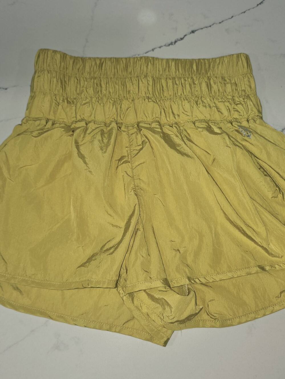 FP Movement "The Way Home" Shorts by Free People in a yellow/gold colorway MED.